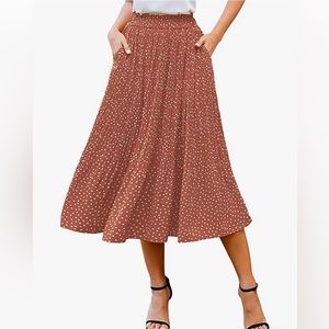 Elastic waist mid length skirt with pockets